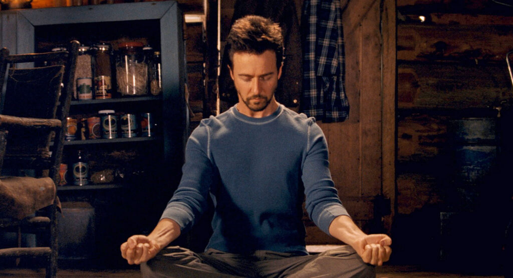 Edward Norton as Bruce Banner mediating in "The Incredible Hulk" (2008).